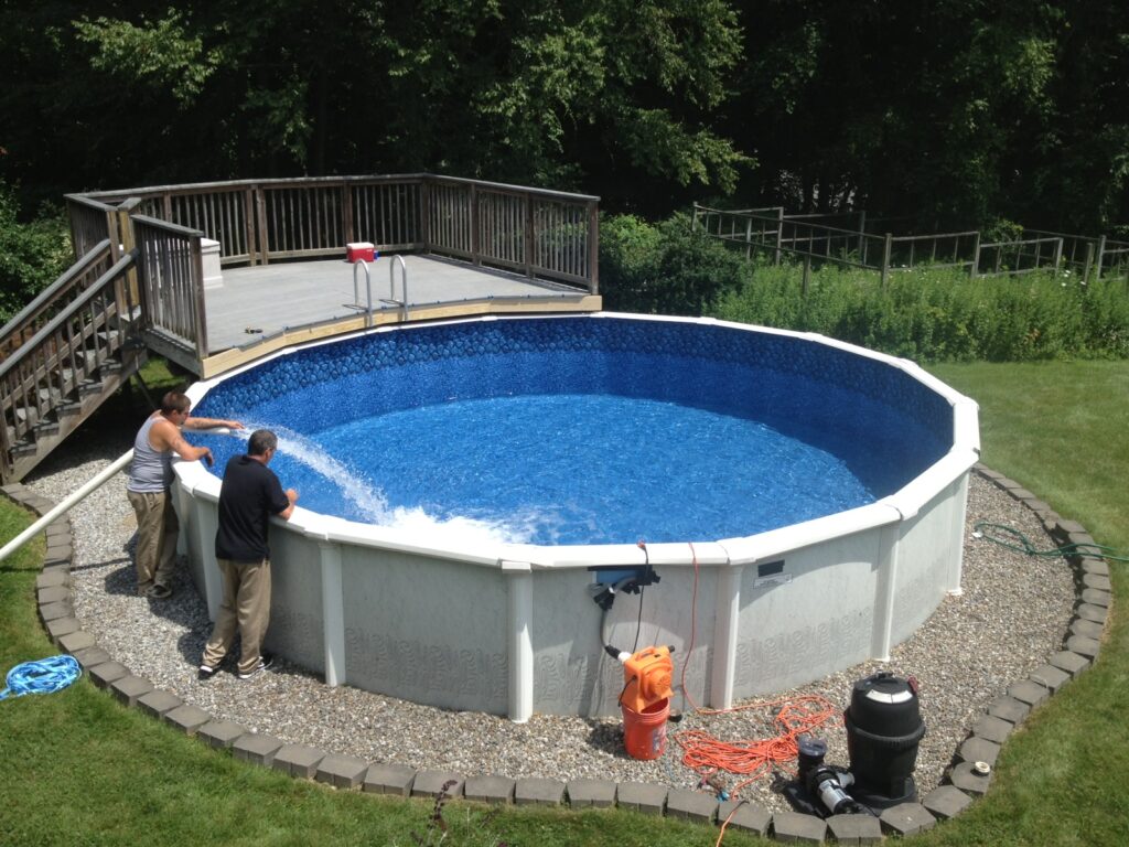 Above ground swimming pool in backyard
