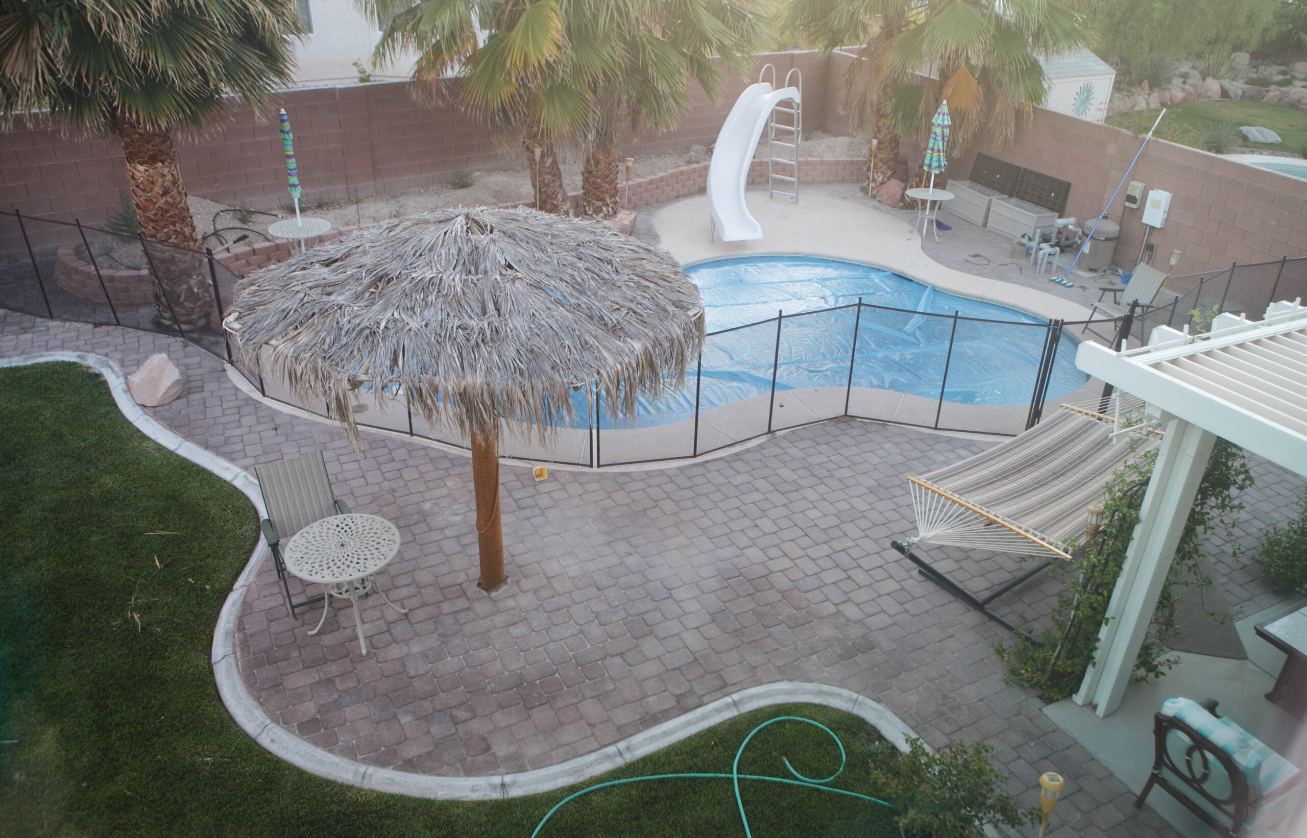 Premium residential backyard swimming pool requiring professional pool heater repair service in Winnipeg